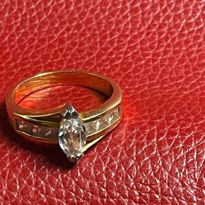 Gold Marquise-Cut Solitaire and Channel-Set Ring